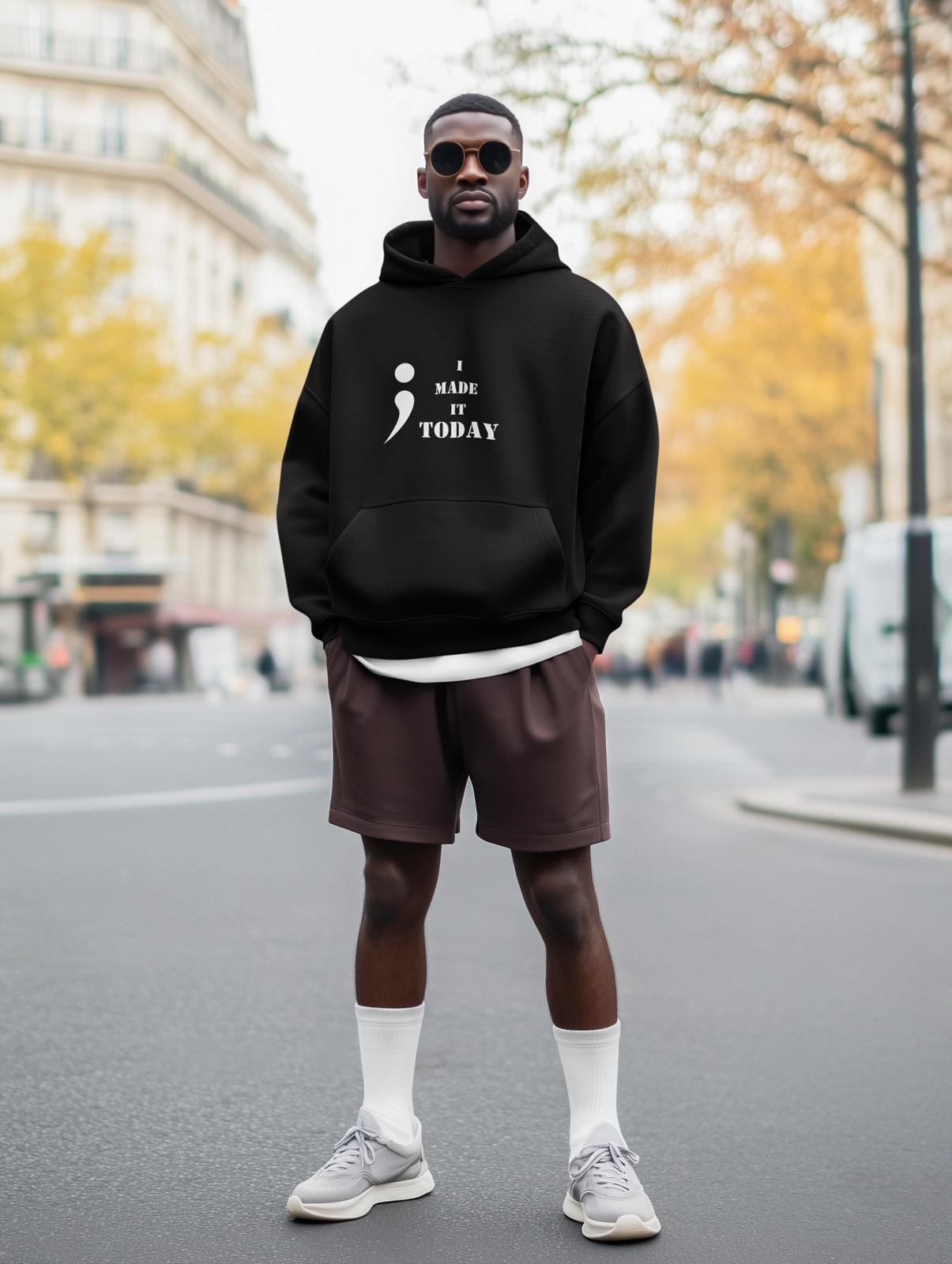 "I Made It Today" hoodie by Rtys3 – minimalist mental health streetwear in black, designed for survival and quiet victories.